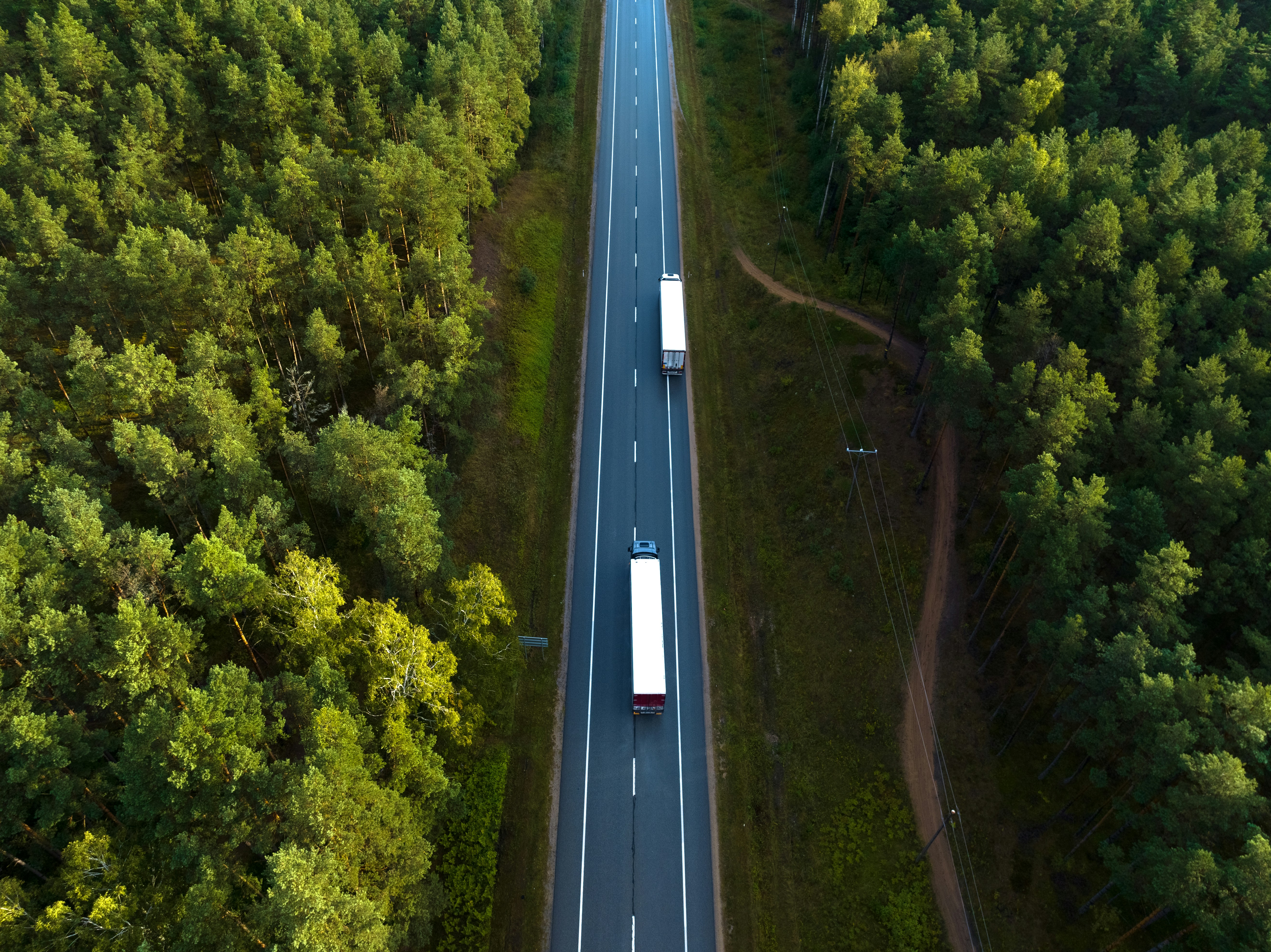Aerial view of highway with trucks